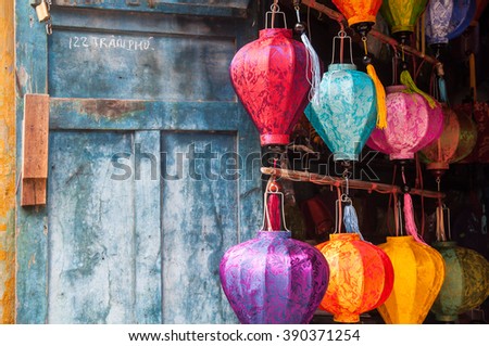 Hoi An, central Vietnam. February 25, 2013 . The traditional Vietnamese silk lanterns on a background of the blue wall.