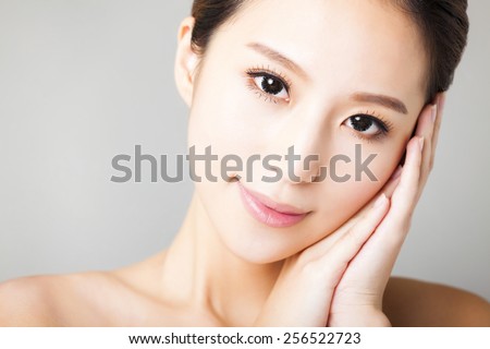 closeup smiling young beautiful woman face