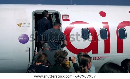 WARSAW, POLAND - MAY, 18, 2017. Air Berlin plane boarding at the airport