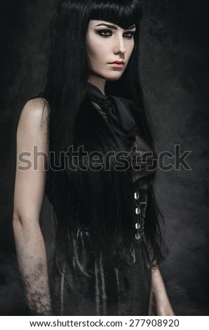 O Chamado da Wyld Stock-photo-portrait-of-a-pale-gothic-woman-in-black-277908920