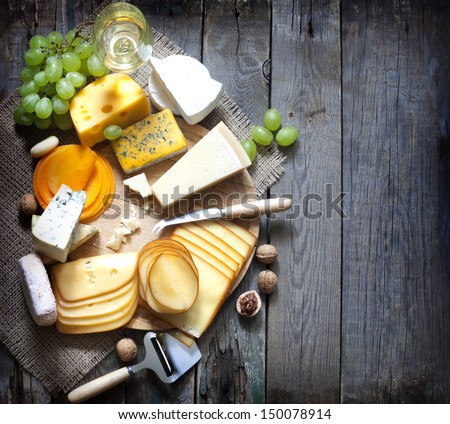 Various types of cheese with empty space background concept