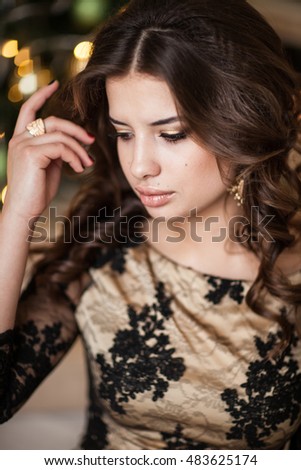 https://thumb1.shutterstock.com/display_pic_with_logo/584602/483625174/stock-photo-christmas-mood-beautiful-woman-model-makeup-healthy-long-hair-style-elegant-lady-in-luxury-483625174.jpg