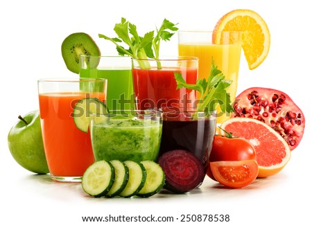 Glasses with fresh organic vegetable and fruit juices isolated on white. Detox diet.