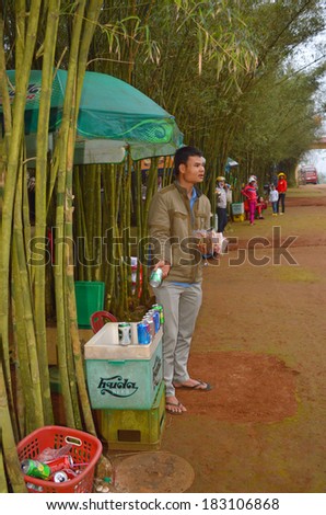 QUANG TRI, VIETNAM - MARCH 13 : Unidentified man is selling food and beverage at Vinh Moc underground tunnel used during B52 carpet bombing between Vietnam war on March 13, 2014 in Quang Tri, Vietnam.