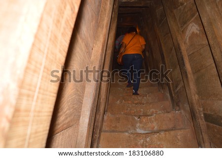 QUANG TRI, VIETNAM - MARCH 13 : Tourists walk into Vinh Moc underground tunnel used during B52 carpet bombing between Vietnam war on March 13, 2014 in Quang Tri, Vietnam.