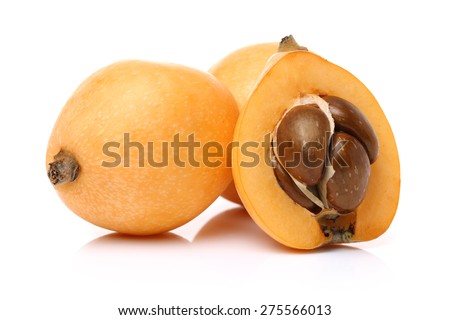 Close up view of some loquat fruit isolated on a white background 