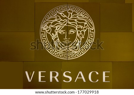 HO CHI MINH CITY, VIETNAM-OCTOBER 31ST 2013: Versace logo on store in Ho Chi Minh City. The logo is based on Medusa who was reputed to be so hideous that men turned to stone when looking at her.