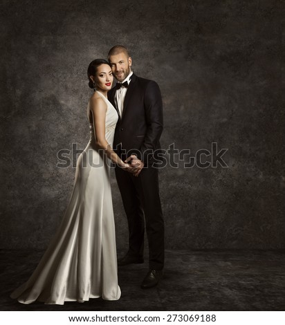 https://thumb1.shutterstock.com/display_pic_with_logo/604900/273069188/stock-photo-wedding-couple-bride-and-groom-fashion-portrait-elegant-suit-long-silk-dress-full-length-273069188.jpg
