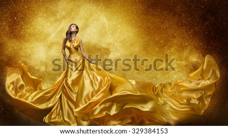 Gold Fashion Model Dress, Woman In Golden Silk Gown Flowing Fabric, Beautiful Girl on Stars Sky looking up