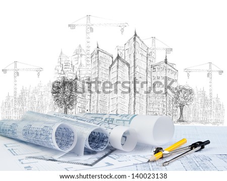 sketching of modern building construction and blueprint on architect working table