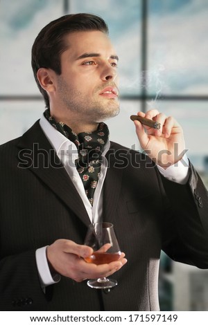 Man Smoking Cigar Drinking Cognac Stock Photo 171597149 - Shutterstock