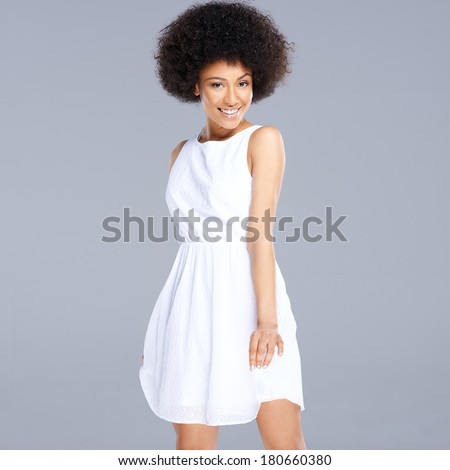 Beautiful young happy African American woman in a fresh short white ...