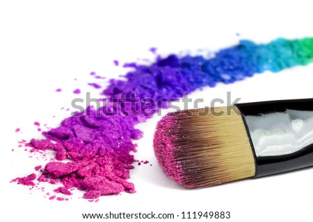 Professional make-up brush on rainbow crushed eyeshadow