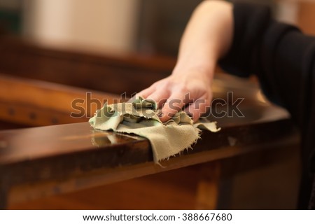 woman restoring furniture