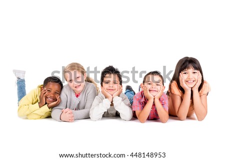 Group of happy children posing isolated in white