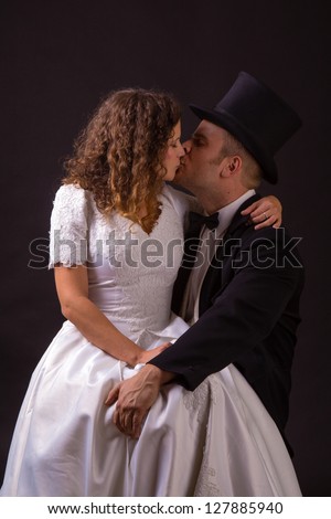 https://thumb1.shutterstock.com/display_pic_with_logo/621745/127885940/stock-photo-happy-bride-and-groom-in-studio-127885940.jpg