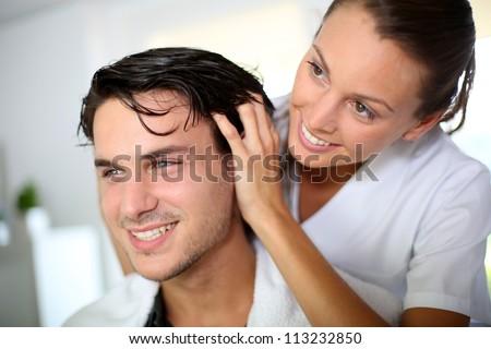 stock-photo-hairdresser-doing-head-massa