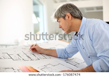 Architect designing house for client