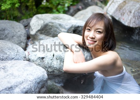 young woman in a hot spring