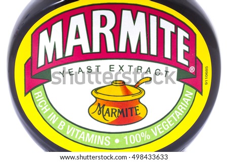 LONDON, UK - OCTOBER 13TH 2016: A shot of the label on a jar of Marmite over a plain white background, on 13th October 2016. The product is made by the Unilever company.