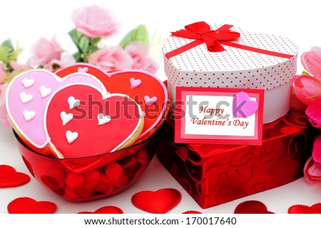 Happy Valentines Day card with gifts and bowl of cookies