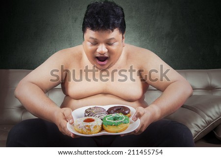 Image result for man looking at a lot of food