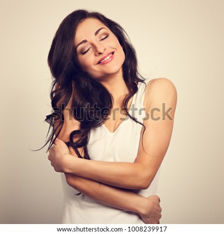 https://thumb1.shutterstock.com/display_pic_with_logo/640141/1008239917/stock-photo-happy-sporty-woman-hugging-herself-with-natural-emotional-enjoying-face-love-concept-of-yourself-1008239917.jpg