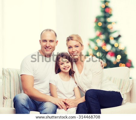 Family Gathered Around Christmas Tree Using Stock Photo 483304177 ...