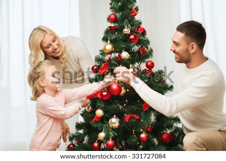 People Decorating For Christmas christmas tree toys stock photos - people images - shutterstock People Decorating For Christmas christmas tree toys stock photos - people images - shutterstock