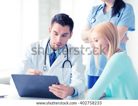 bright picture of male doctor with patient