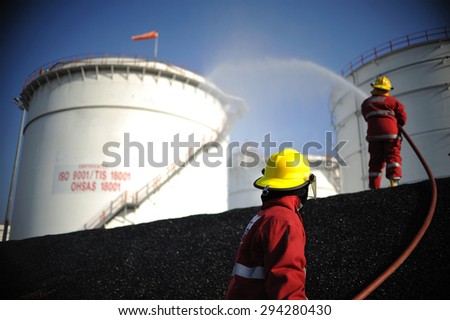 practice fireman extinguish oil spill petrochemical industrial.