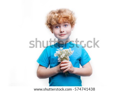 boy with red hair and freckles, ?hild with a bouquet of white flowers in a blue shirt isolated on white background, son gives mom flowers on Women's Day, Mother's Day, birthday