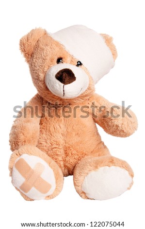 teddy bear with bandage on head