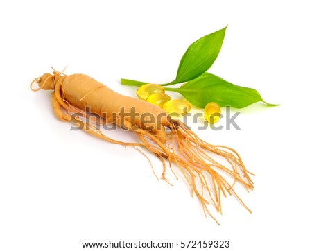 Ginseng root with pills and leawes. Isolated.