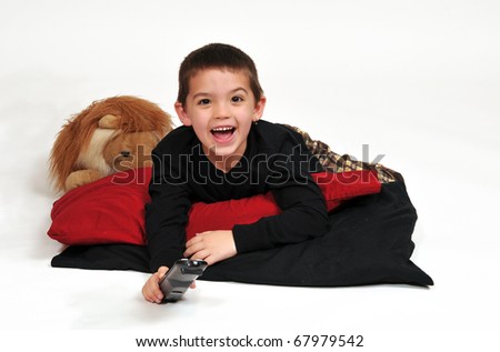 Young Boy Lounging On Pillows On Stock Photo 67979164 - Shutterstock