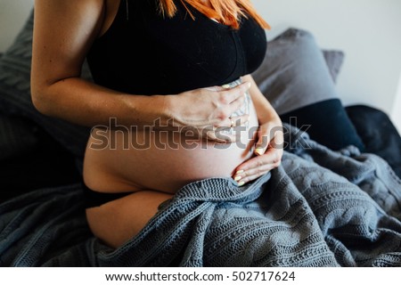 Pregnant Women Posing For Camera 106