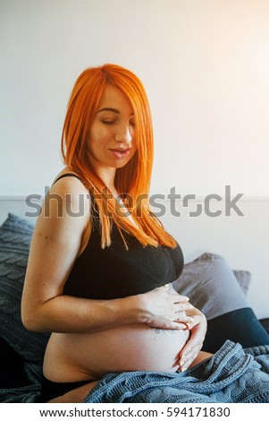 Pregnant Women Posing For Camera 116