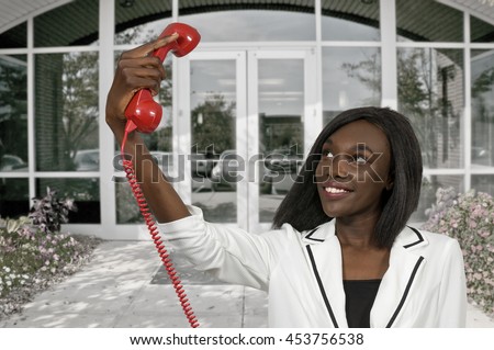 https://thumb1.shutterstock.com/display_pic_with_logo/66811/453756538/stock-photo-beautiful-woman-trying-to-take-a-selfie-with-a-rotaryl-phone-453756538.jpg