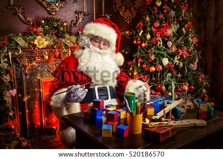 Workshop Of Santa Claus Portrait Making Christmas Gifts At Home Near Beautiful