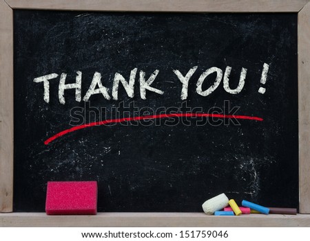 THANK YOU written with chalk on black chalkboard 