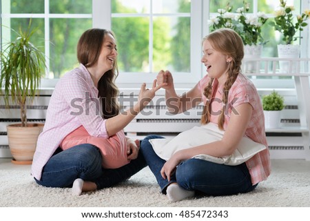 Mom and daughter scissoring Mom and daughter scissoring