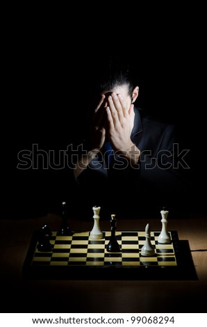 Chess player playing his game