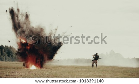 On the battlefield near the soldier explodes mine. Shelling rebels with mortars. Military actions in the movie. Stuntman