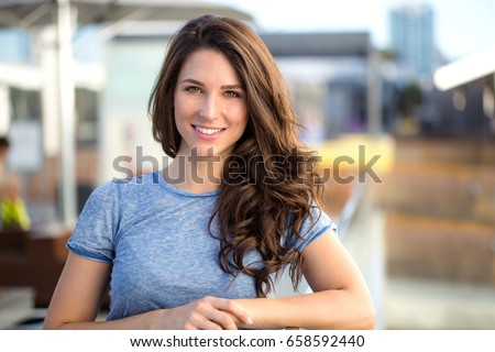 https://thumb1.shutterstock.com/display_pic_with_logo/698308/658592440/stock-photo-beautiful-woman-with-perfect-white-teeth-smile-at-an-outdoor-mall-casual-cheerful-658592440.jpg