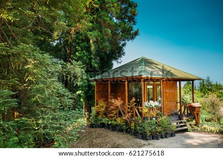 wooden shed house with flowers beds in botanical garden in batumi adjara georgia sunny - Garden Sheds Georgia wooden shed house with flowers beds in botanical garden in batumi adjara georgia sunny - Garden Sheds Georgia