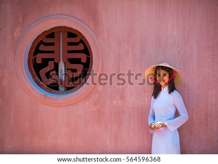 vietnam girl walk in Thien Mu temple hue town