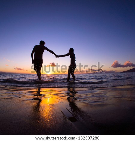https://thumb1.shutterstock.com/display_pic_with_logo/71381/132307280/stock-photo-romantic-couple-enjoying-a-beach-walk-at-sunset-132307280.jpg