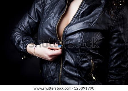 Boobs in leather vest