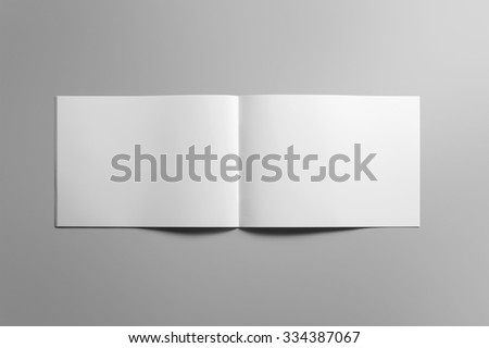 Blank landscape brochure magazine isolated on cardboard background, with clipping path, changeable background