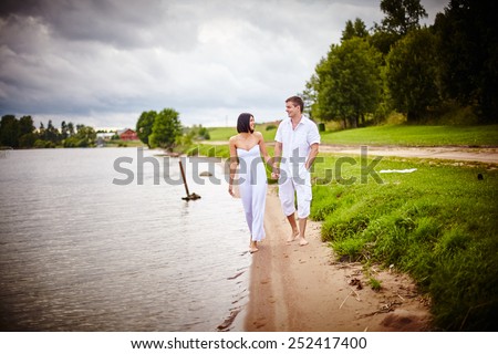 https://thumb1.shutterstock.com/display_pic_with_logo/742069/252417400/stock-photo-couple-in-love-near-the-water-couple-having-a-great-day-love-valentines-day-romantic-time-252417400.jpg